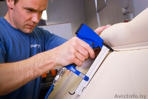 Обивщик мебели.